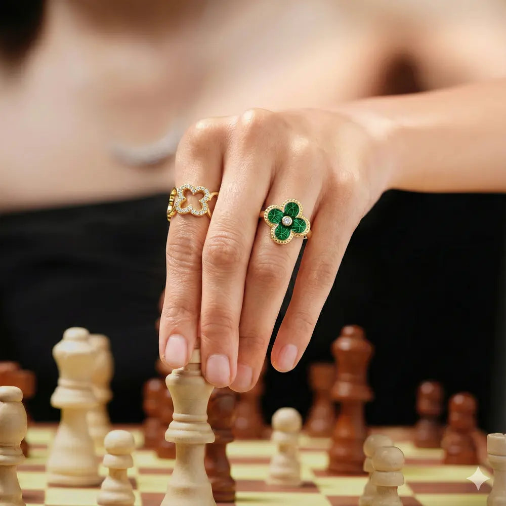 Side detail of the green clover ring showing the open-back adjustable band, 14K gold plating and vibrant green zirconia stones. Hallmarked Loretana piece, hand-finished in Kaunas.