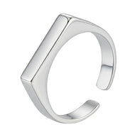 925 silver adjustable rectangle ring featuring a polished engravable face on white.