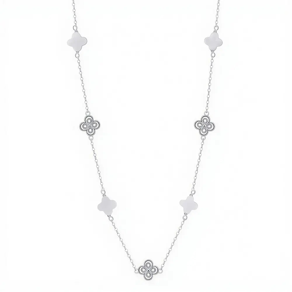Close up of 925 silver clover necklace showing iridescent shell pearl inlay