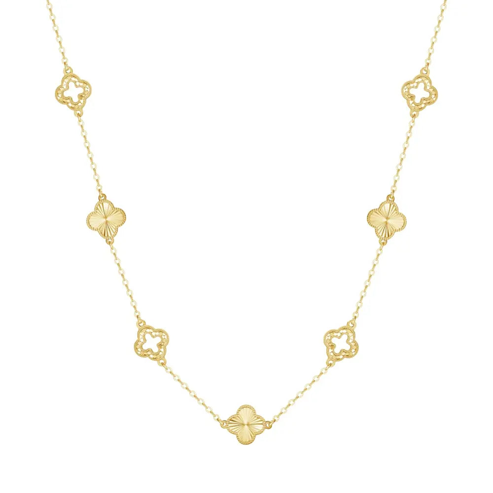 Gold necklace with clover-shaped pendants on a white background