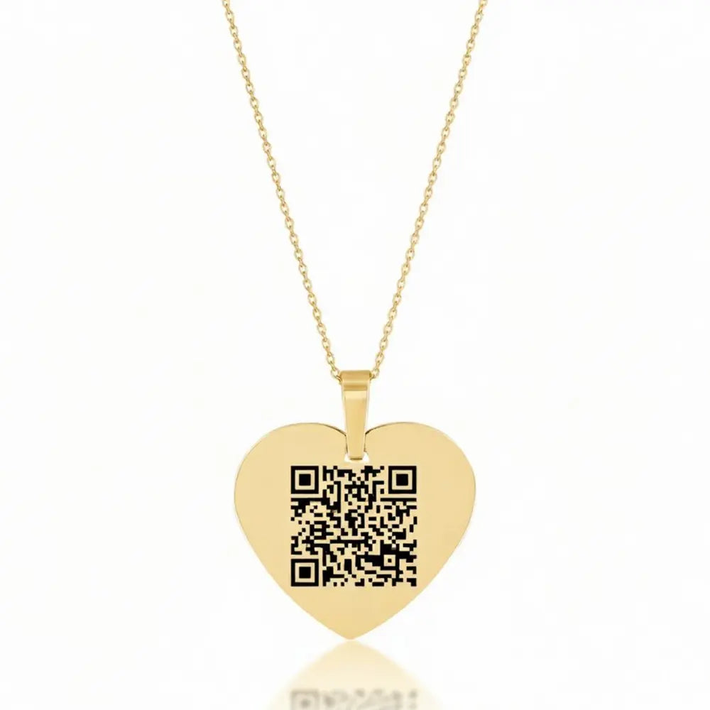 14K Gold Photo Engraved Heart Necklace styled within a curated layered gold stack