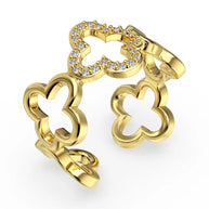 Top view of the Bloom four leaf clover ring in 925 sterling silver with 18K gold plating and AAAAA cubic zirconia on white. Hallmarked Loretana piece, hand-finished in Kaunas.