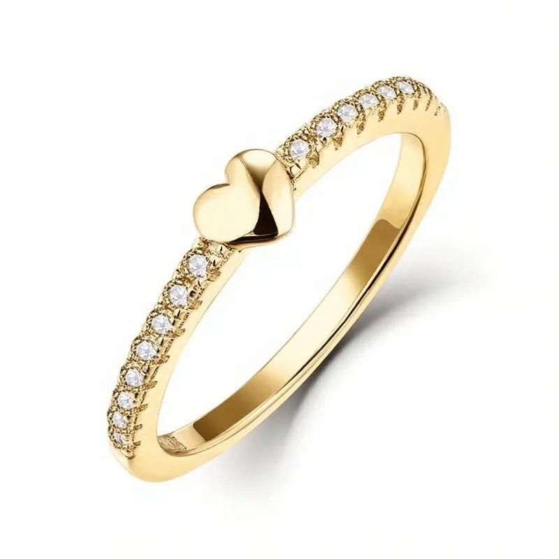 Front view of the 14K gold plated 925 silver heart ring on white, showing the AAAAA cubic zirconia heart cut centerpiece. Hallmarked Loretana piece, hand-finished in Kaunas.