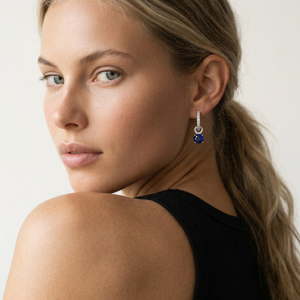 Model wearing the Interchangeable Halo Hoops, Blue CZ in 925 sterling silver