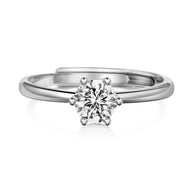 Close-up of a woman's hand wearing the personalized 925 silver birthstone ring from the Diamond Series.
